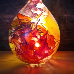 Luminaire Sublime Dame Jeanne Bubble Gum, aux tons Rose et viel or.