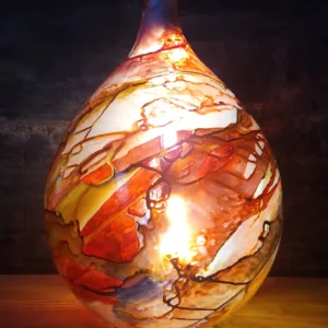 Luminaire Sublime Dame Jeanne Bubble Gum, aux tons Rose et viel or.